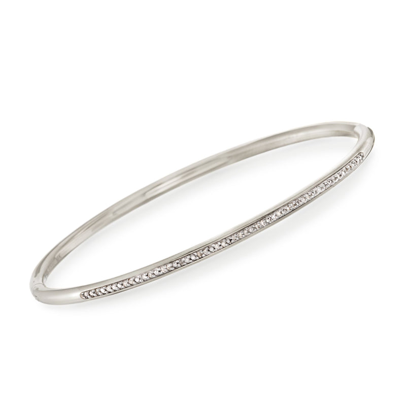 Diamond bangle bracelet in sterling silver and stainless steel with pavé accent row