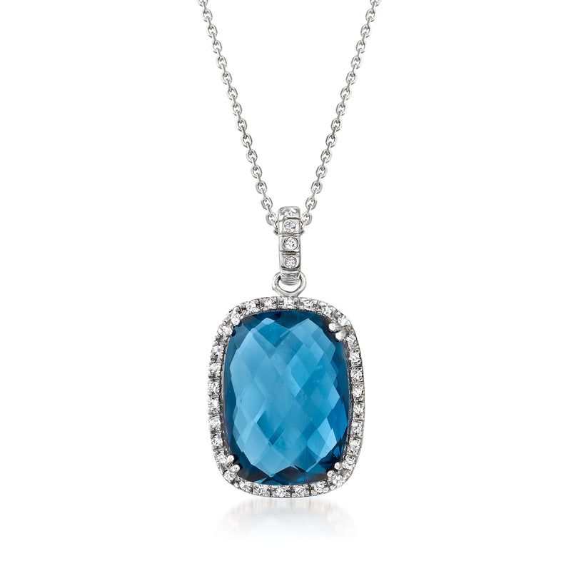 14kt white gold pendant necklace with oval blue topaz and diamond halo