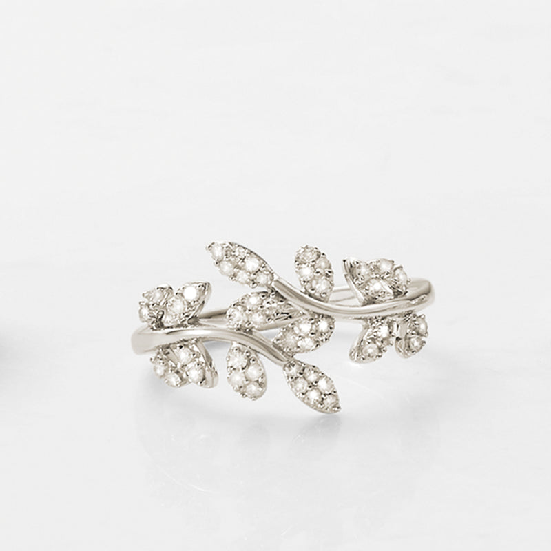 Sterling silver diamond vine ring with small clustered leaf stones, side view