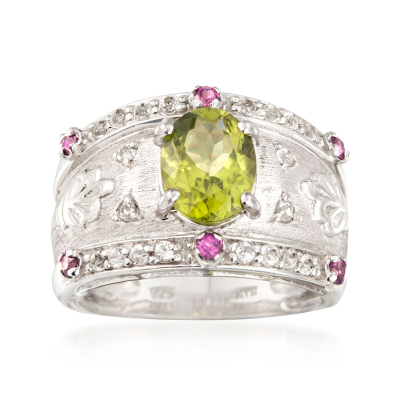 Sterling silver multi-stone ring with oval peridot-green center and pink side stones