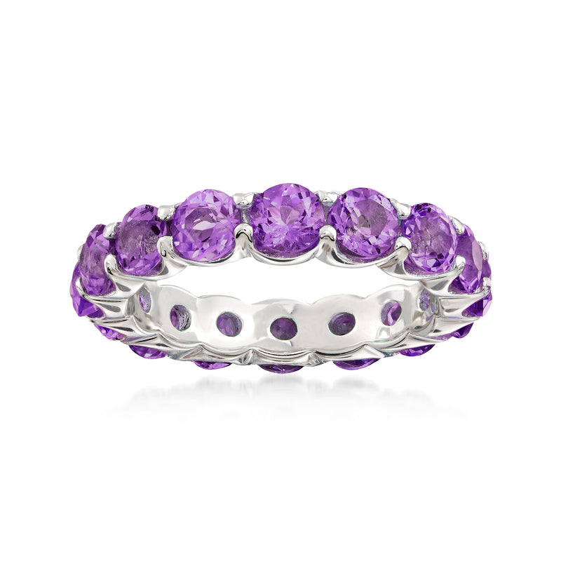 Sterling silver eternity band with round purple amethyst stones across the top