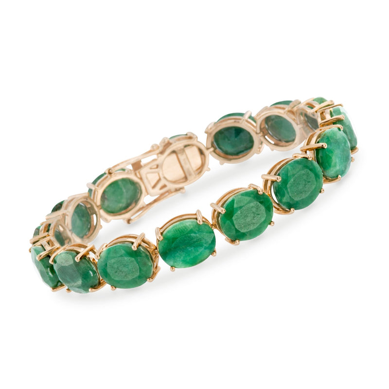Green sapphire tennis bracelet with oval gemstones in 14kt gold over sterling