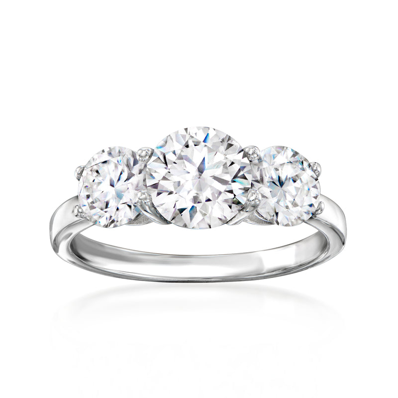 Three-stone CZ ring in sterling silver with round center and two side stones