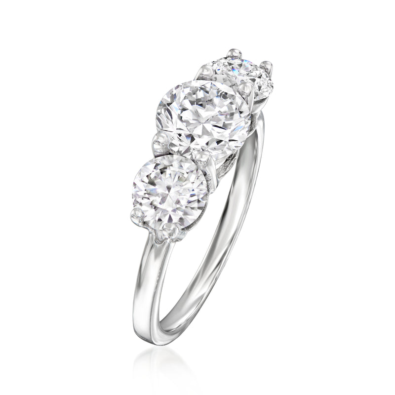 Three-stone CZ ring in sterling silver, side view with three round-cut stones