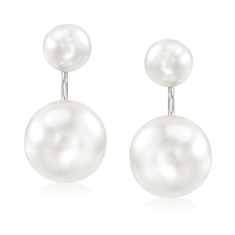 Sterling silver drop earrings with two white round shell pearls, front and back