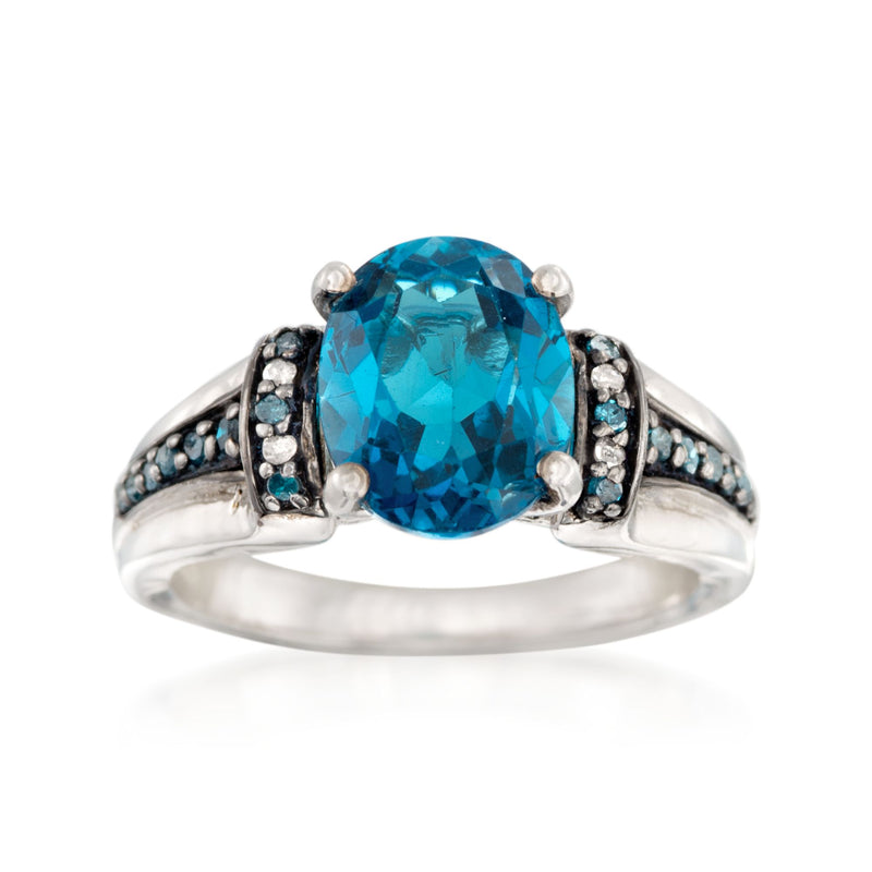 Sterling silver ring with oval London blue topaz center and blue/white diamond accents