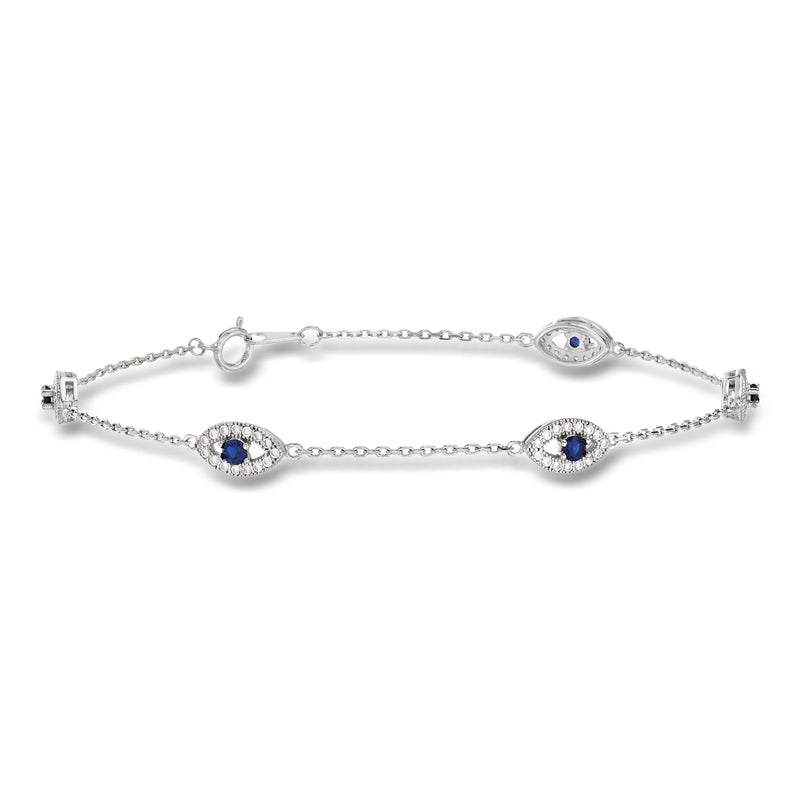 Sterling silver evil eye station bracelet with oval blue stones and CZ accents