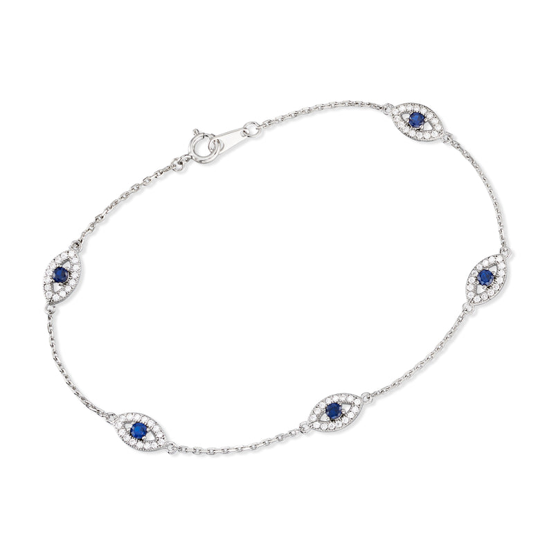Sterling silver evil eye bracelet with oval blue eye motifs along the linked chain