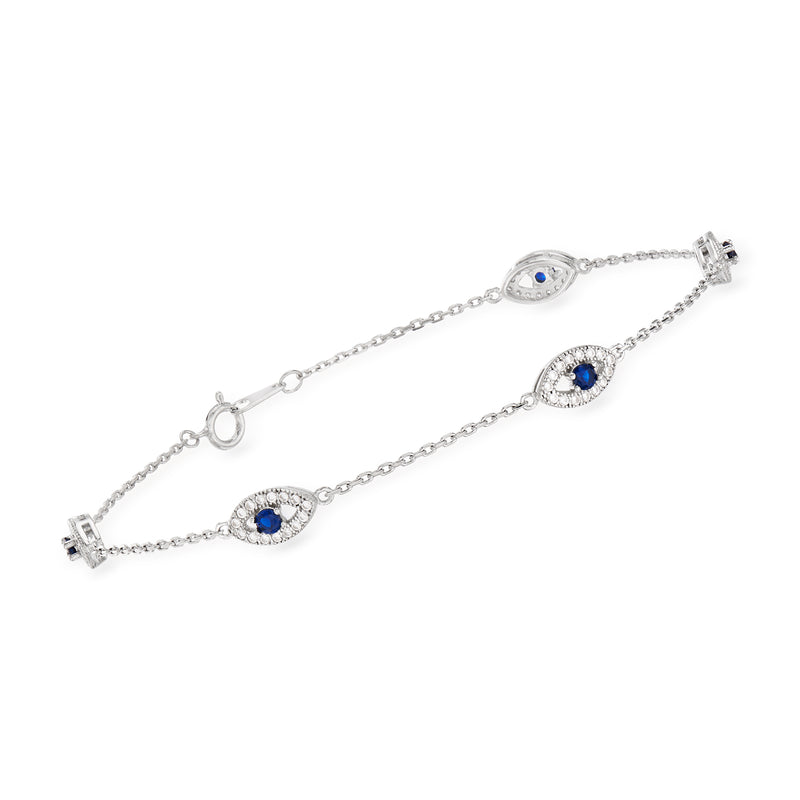 Sterling silver evil eye station bracelet with oval blue eye charms and clasp