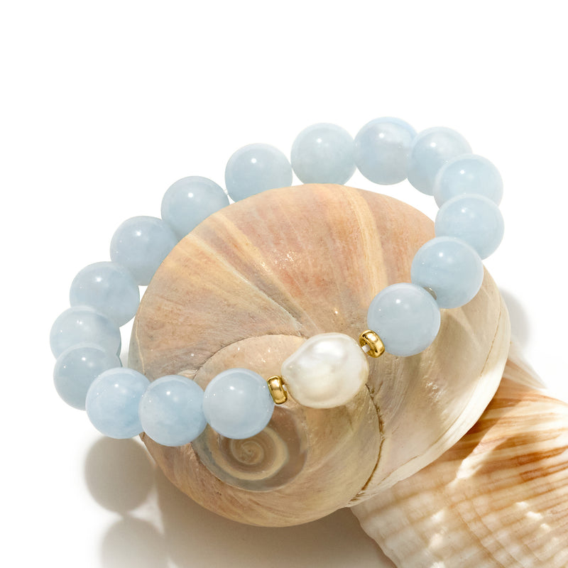 Aquamarine bead stretch bracelet with large baroque white pearl and small gold connectors