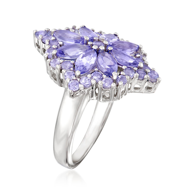 Sterling silver ring with lavender oval gemstones in a curved flower setting, side view