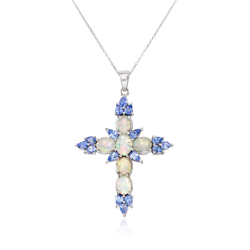 Sterling silver cross pendant necklace with blue stones and opal-like center
