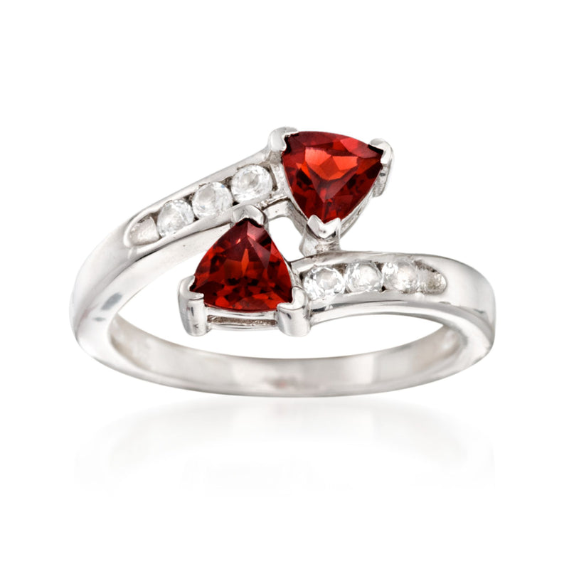 Sterling silver bypass ring with red garnet pear stones and white topaz accents