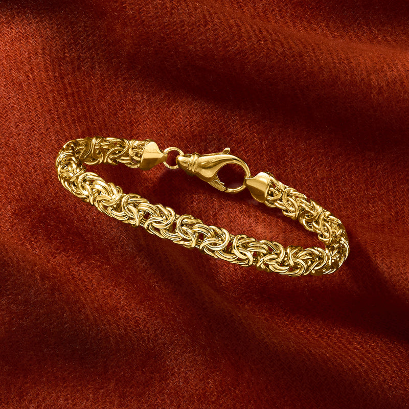 Gold-tone Byzantine link bracelet with hinge clasp, shown at angle