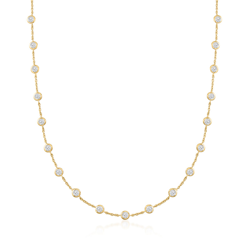 18kt gold over sterling CZ station necklace with round bezel-set stones on a fine chain