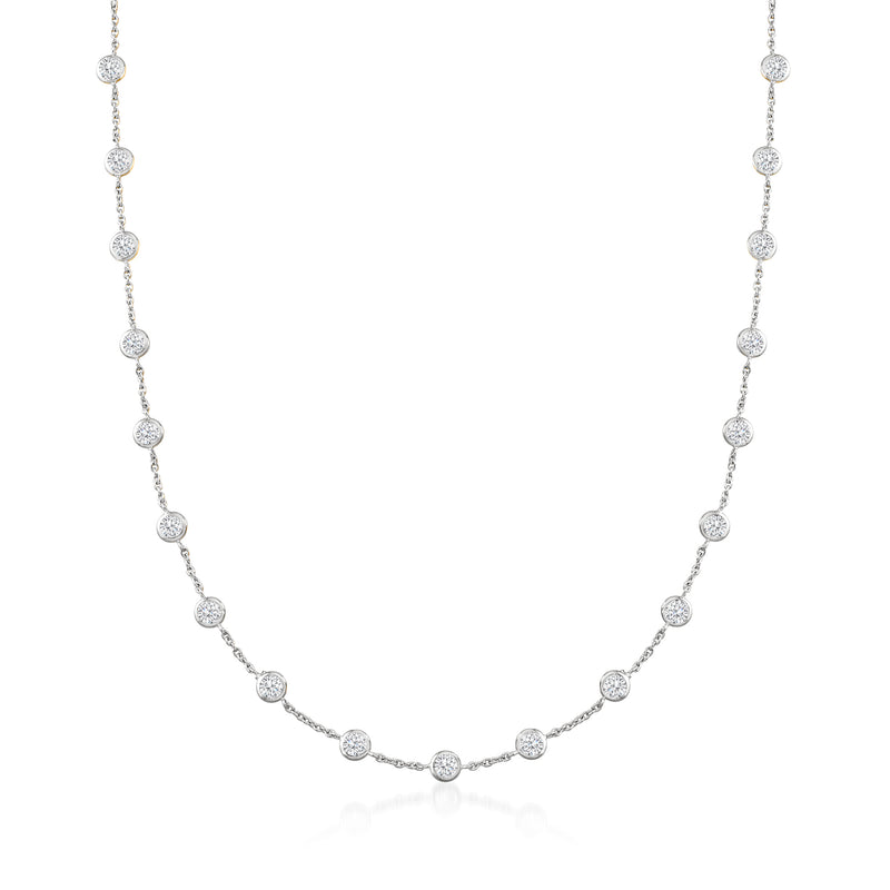 Sterling silver station necklace with bezel-set round CZ stones