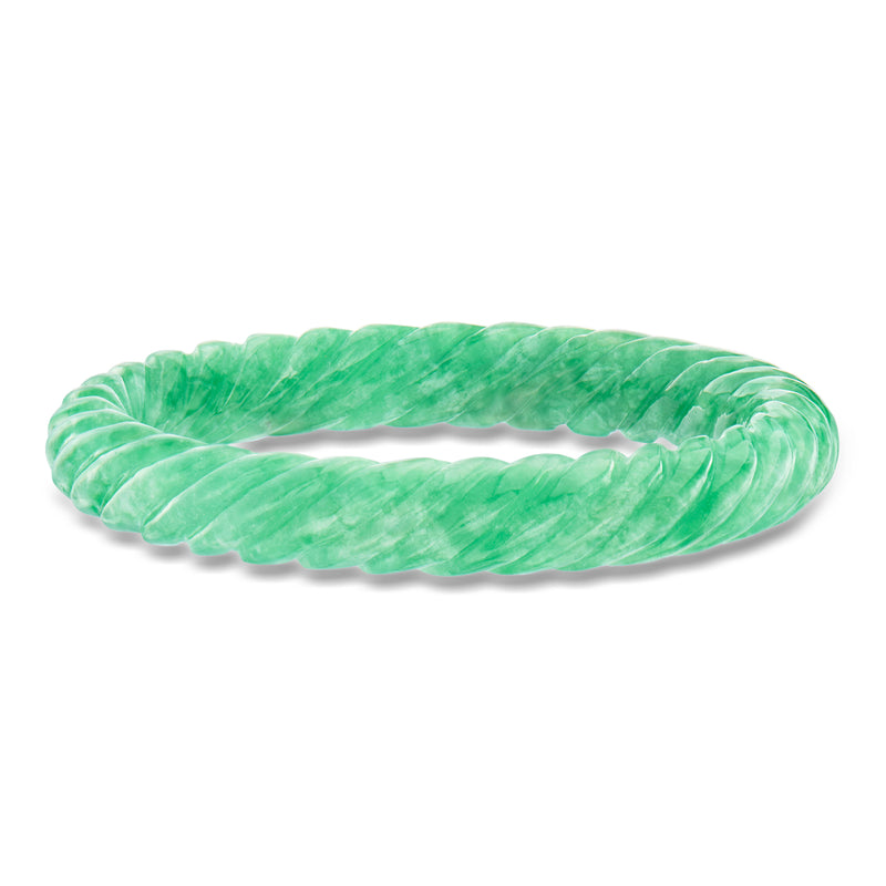 Carved jade bangle bracelet in bright light-green with sculpted oval ridges