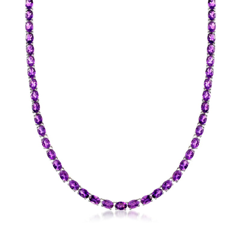 Amethyst tennis necklace in sterling silver with purple oval gemstones, full length view