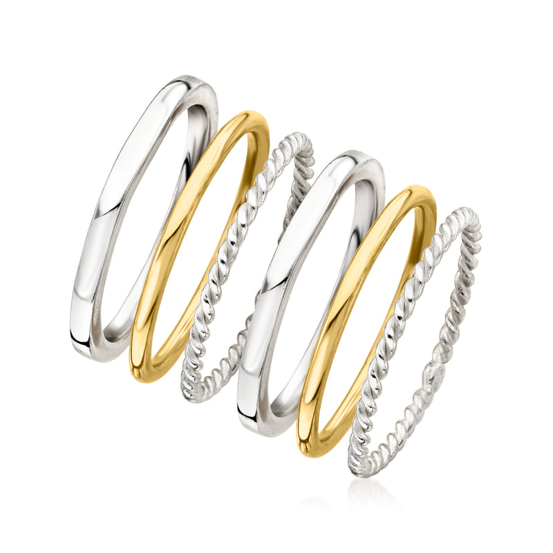 Stackable rings: polished silver bands, gold band, and twisted rope silver bands