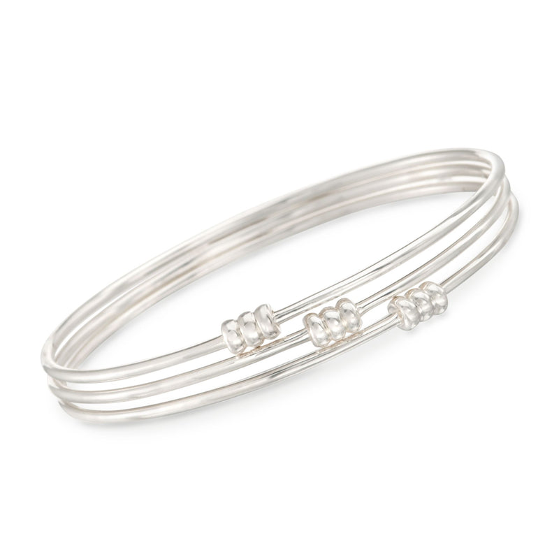 Silver bangle bracelet set with three slim bangles and small bead accents