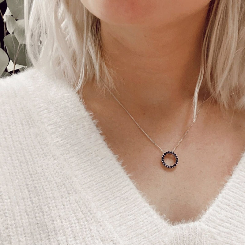 Sterling silver sapphire circle pendant necklace on chain, small round blue ring