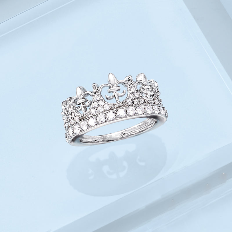 Sterling silver CZ crown fleur-de-lis ring on band, three-quarter angle