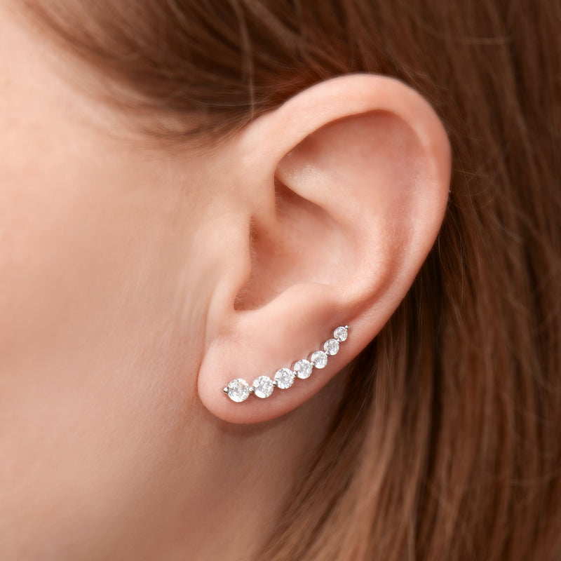 Close-up: sterling silver CZ ear climbers with graduated round stones