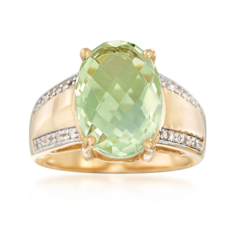 14kt gold over sterling ring with large oval green gemstone and small white stones