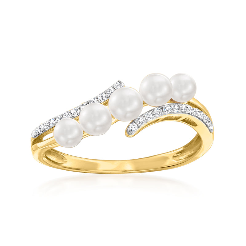 Cultured pearl wave ring in 14kt yellow gold with three 3-4mm pearls and diamond accents