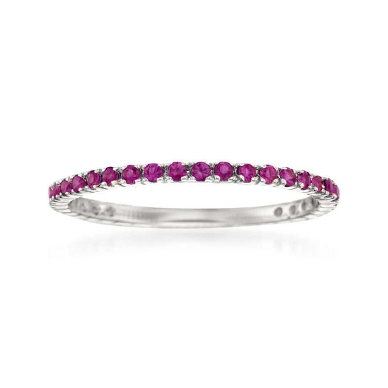 14k white gold ruby eternity band with small oval purple-red stones