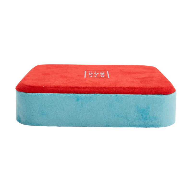 Small velour jewelry tray with red top and blue sides, rounded edges