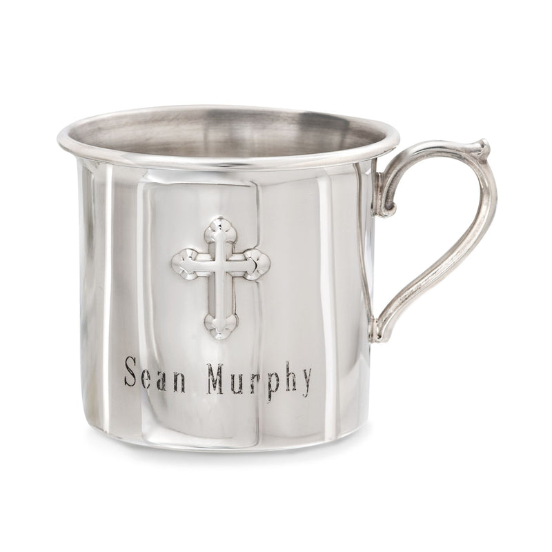 Pewter baby cup with raised cross and curved handle, engraved 'Sean Murphy'