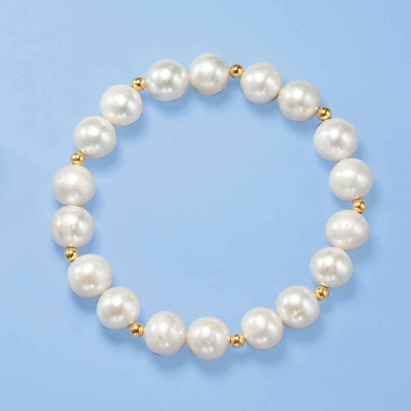 Cultured pearl stretch bracelet in a full circle view, white pearls with gold beads
