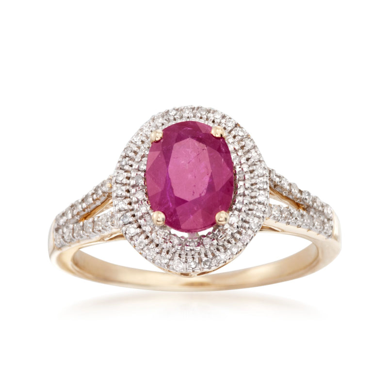 Oval ruby center halo diamond ring in 14kt yellow gold