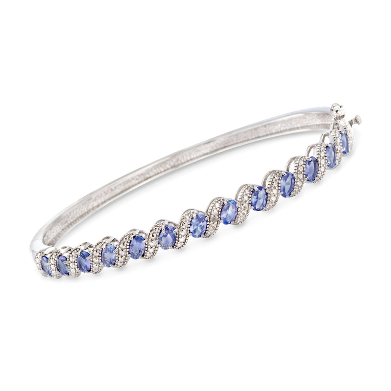 Sterling silver tanzanite bangle bracelet with oval blue gemstones and diamond accents