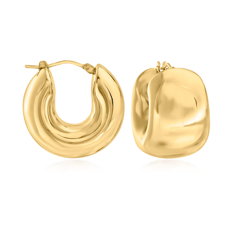 Wide huggie hoop earrings in yellow gold-tone with smooth oval profile