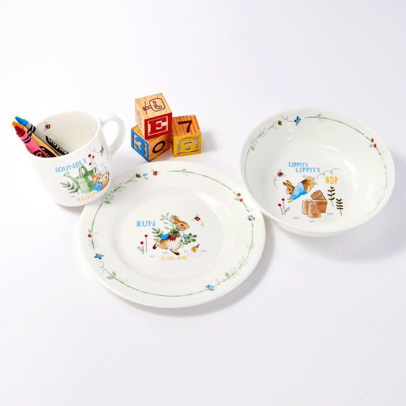 Three-piece children’s dinnerware set with Peter Rabbit graphics: plate and 2 bowls