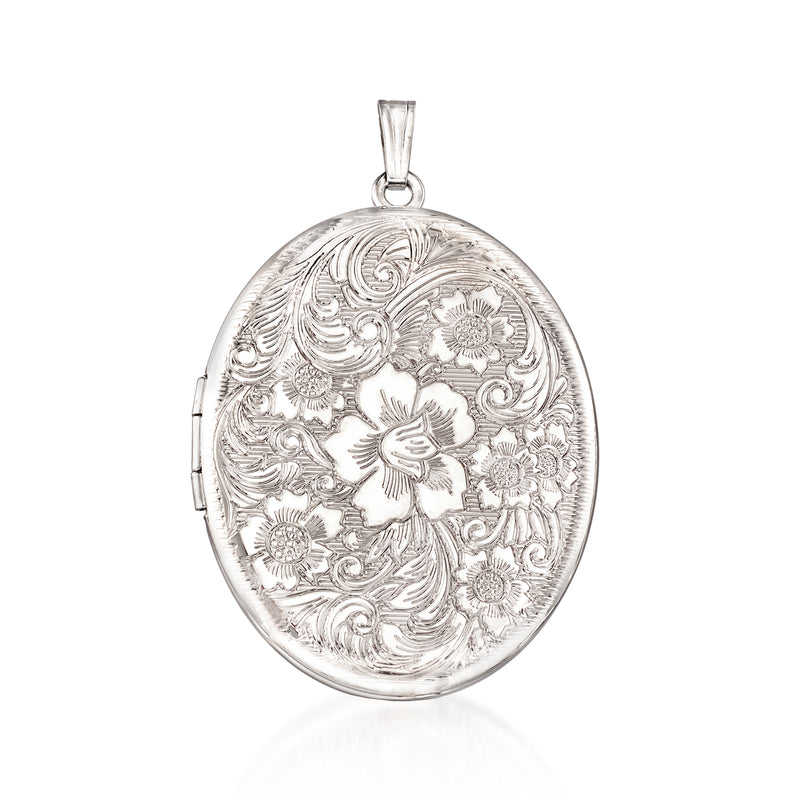 Oval sterling silver locket pendant with engraved floral pattern and hinged back