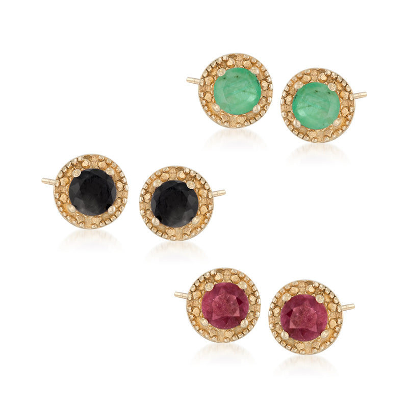 Three-pair round multi-gemstone stud earrings with halo settings: green, black, pink.