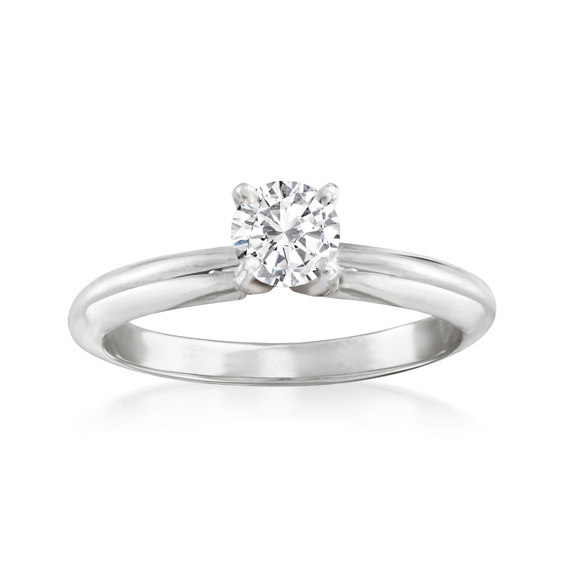 14kt white gold diamond ring with round center stone and four-prong setting
