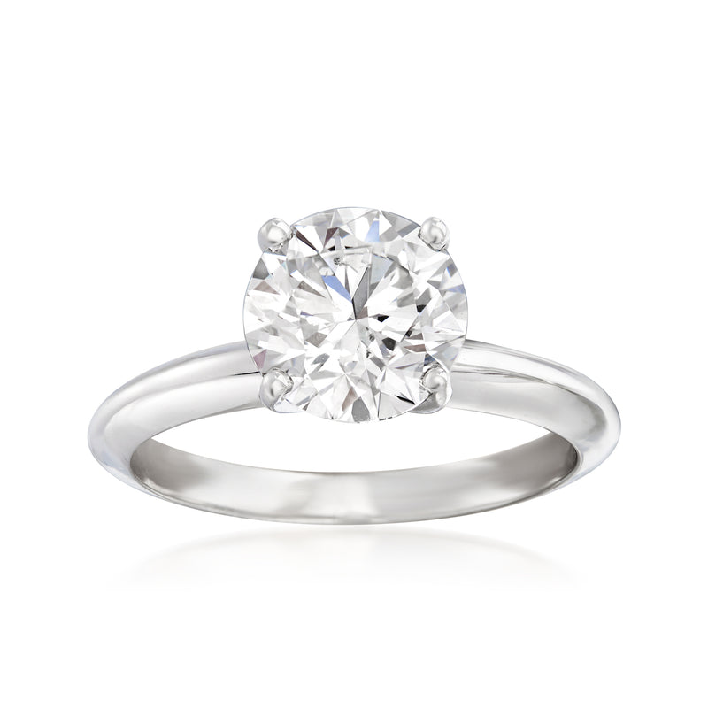 Platinum solitaire engagement ring with round brilliant center diamond and prong setting