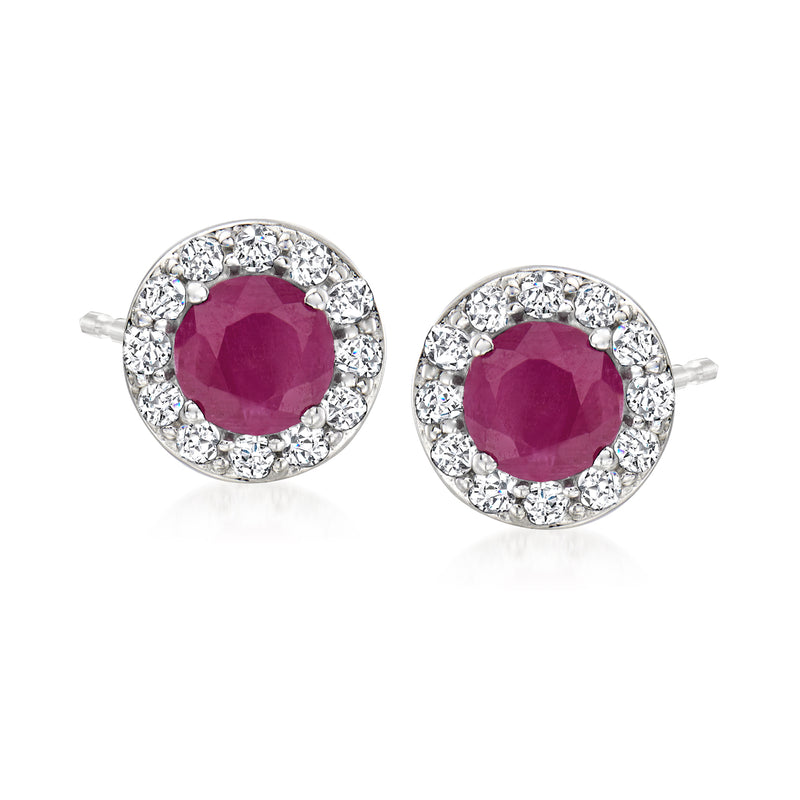 Ruby and diamond halo stud earrings in white gold, round purple center stones