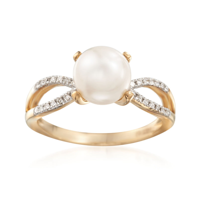 Pearl and diamond ring in 14kt yellow gold with curved pavé bands