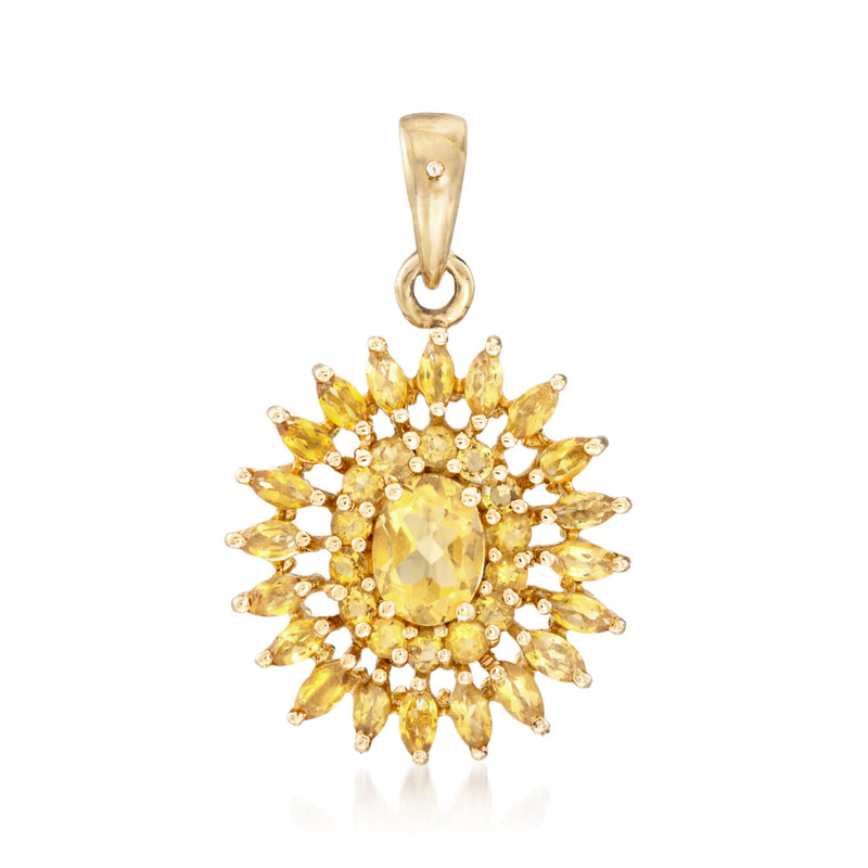Citrine sunburst pendant with oval center stone and white accents in gold setting