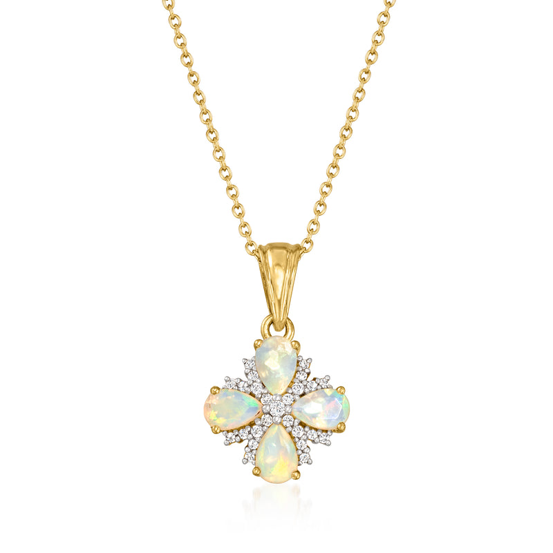 Gold pendant necklace with opal-like floral flower and clear stones on link chain