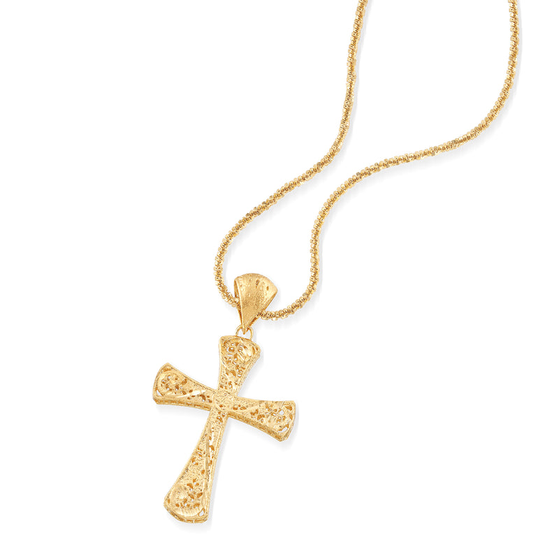 Gold filigree cross pendant with bail and thin chain, angled view