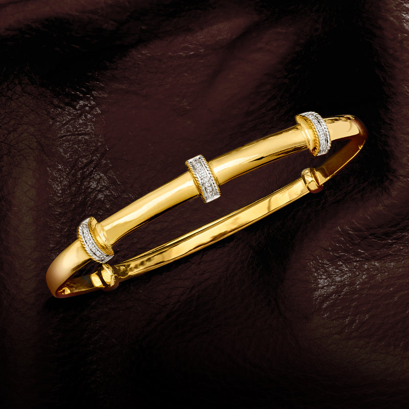 Diamond station bangle bracelet in gold over sterling, with three pave accents