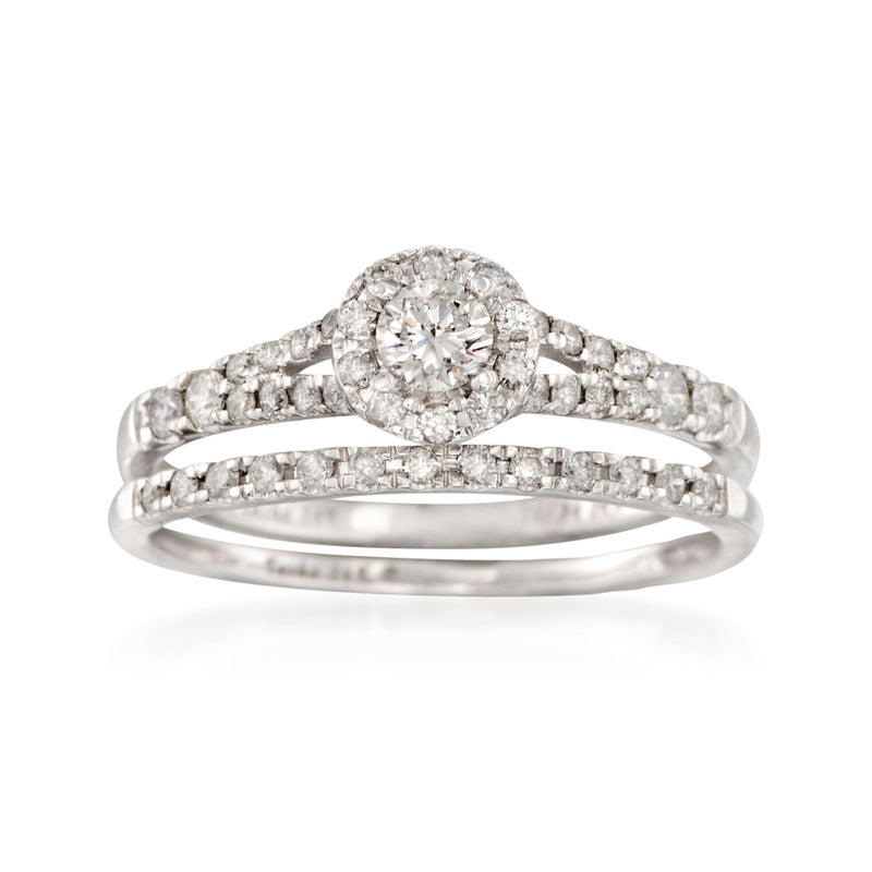 Diamond bridal set with round halo engagement ring and matching band in white gold