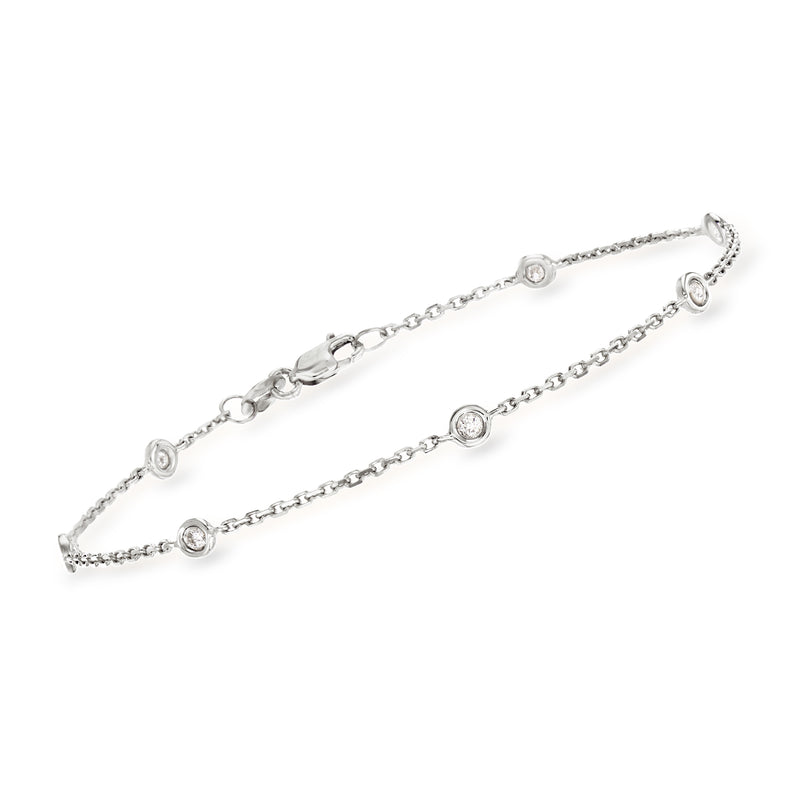 14kt white gold diamond station bracelet with round bezel-set stones