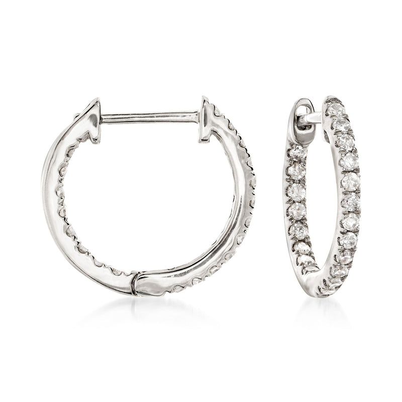 14kt white gold huggie hoop earrings with diamond rows on the inside and outside